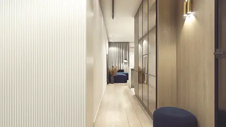 Wnętrze nowoczesnego korytarza z elementami minimaluxe, stylowe meble i oświetlenie.