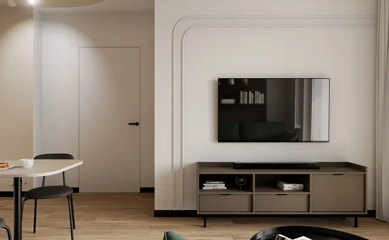 Salon w stylu minimalistycznym i współczesnym z zieloną kanapą i telewizorem