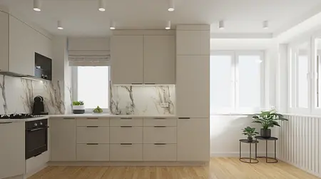Wnętrze kuchni z beżowymi meblami i marmurowym blatem, nowoczesny design.
