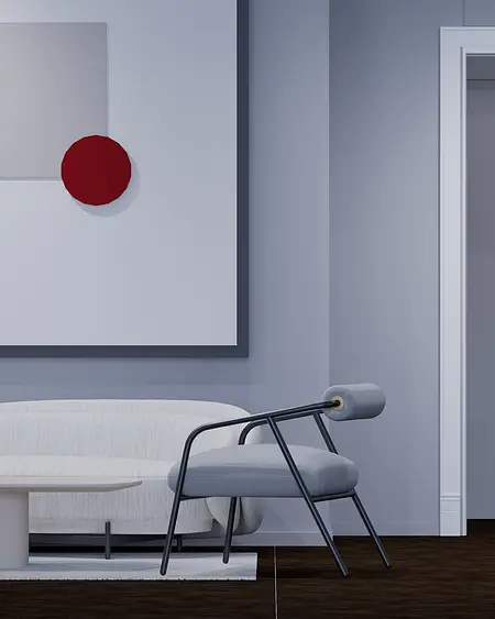 Nowoczesne wnętrze w stylu japandi z szarym fotelem, białą sofą i minimalistycznymi akcentami.