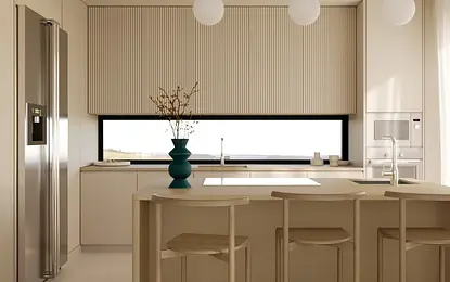 Kuchnia w stylu minimalistycznym z jasnymi meblami i drewnianymi detalami.