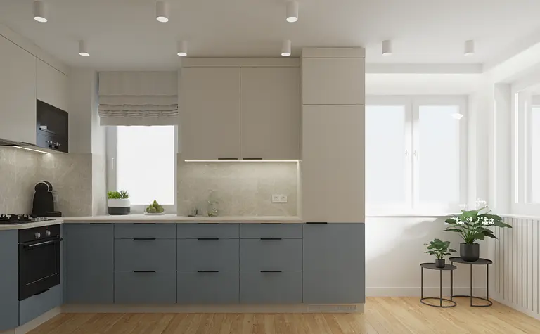 Kuchnia z szarymi meblami, niebieskimi frontami i roślinami.