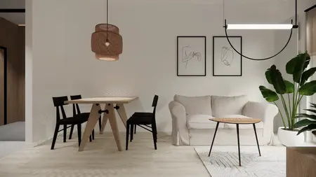 Wnętrze jadalni w stylu minimalistycznym z drewnianym stołem, czarnymi krzesłami oraz rośliną.