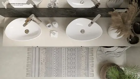 Nowoczesna łazienka z białymi umywalkami, szarym blatem i boho dekoracjami.