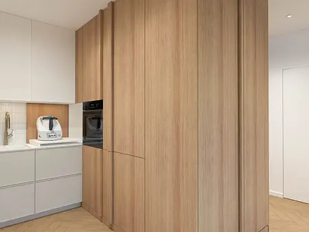 Kuchnia japandi z drewnianymi szafkami i minimalistycznym designem.