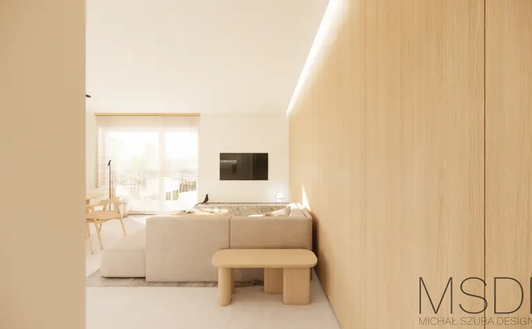 Wnętrze salonu w stylach boho i skandynawskim z beżową sofą i drewnianymi detalami.