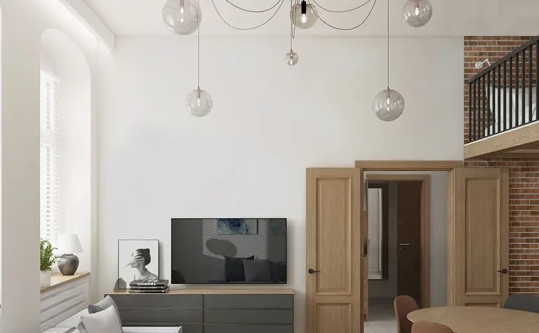 Wnętrze salonu w stylu eklektycznym i industrialnym z nowoczesnym oświetleniem.