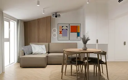 Nowoczesne wnętrze z minimalistyczną kanapą i drewnianym stołem, idealne do małego salonu.