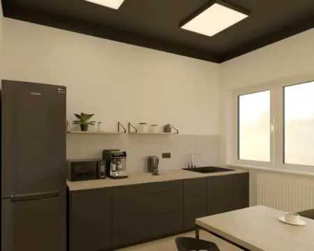 Kuchnia w stylu industrialnym z czarnymi meblami i drewnianym blatem.