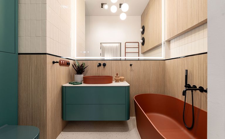 Nowoczesna łazienka z zielonymi meblami i brązową wanną, współczesny design.