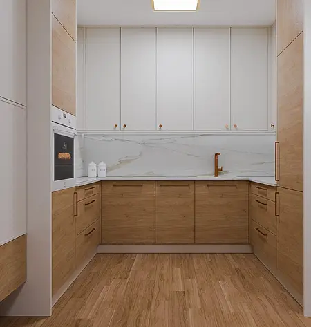 Kuchnia w stylu quiet luxury z drewnianymi meblami i białym blatem.