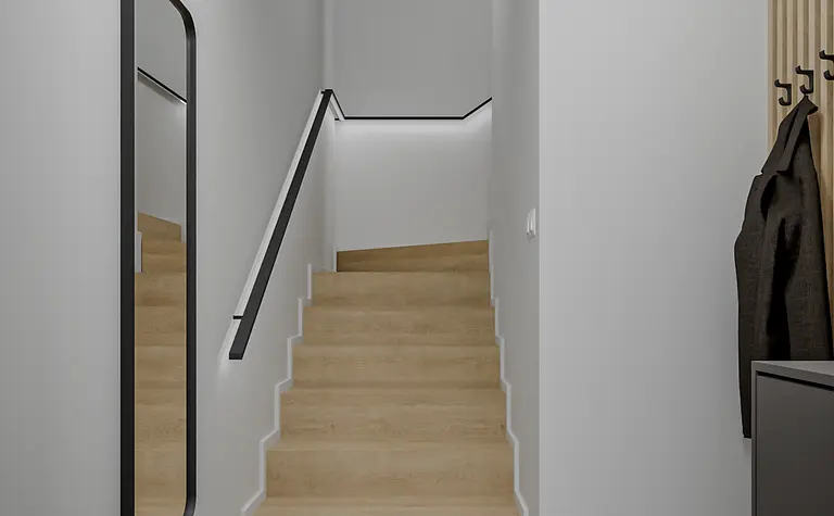 Przedpokój z minimalistycznym wystrojem, drewnianymi schodami i nowoczesnym lustrem.