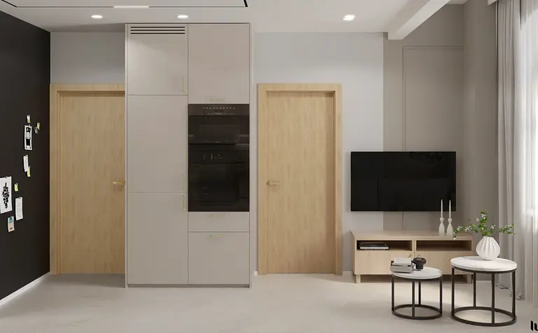 Wnętrze kuchni w stylu japandi, minimalistycznym i nowoczesnym z szarymi meblami.