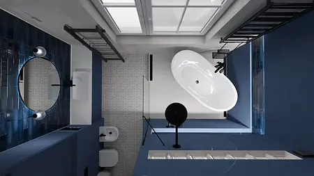 Wnętrze łazienki w stylu art deco z niebieskimi płytkami i białą wanną.