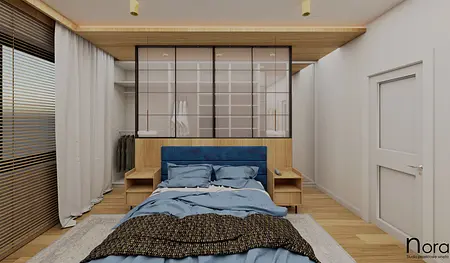 Sypialnia w stylu skandynawskim z niebieską pościelą i drewnianymi elementami