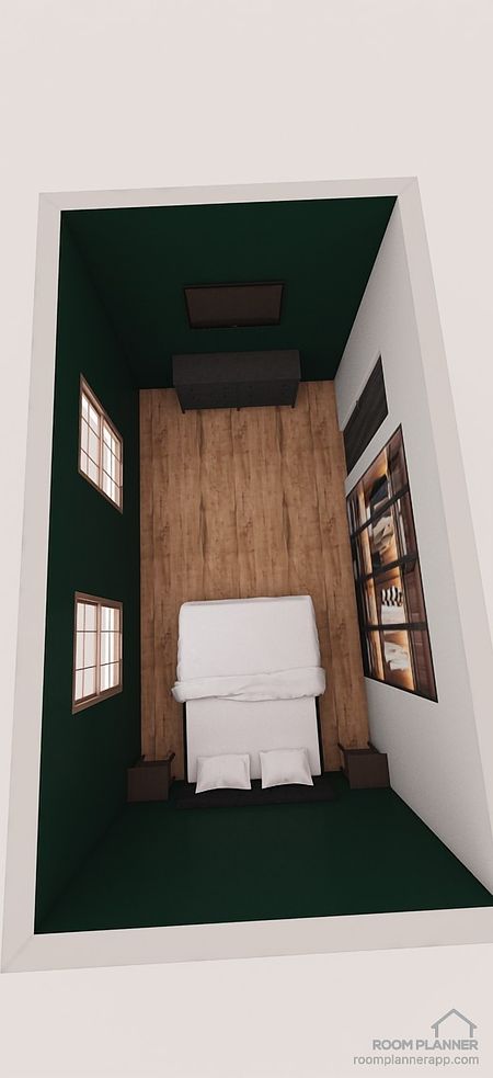 Wnętrze sypialni z zielonymi ścianami, drewnianą podłogą i białym łóżkiem