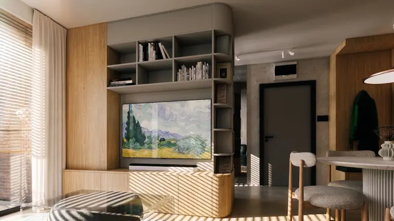 Wnętrze salonu w stylu skandynawskim z drewnianymi elementami, telewizorem i nowoczesnym oświetleniem.