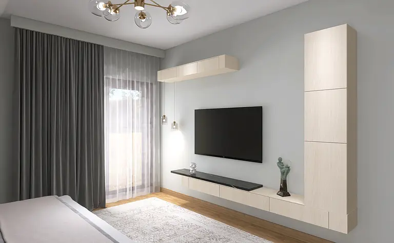 Salon z telewizorem na ścianie, minimalistyczne meble i zasłony.