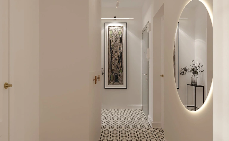 Przedpokój w stylu eklektycznym z nowoczesnym lustrem i quiet luxury detalami.
