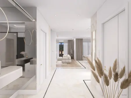 Nowoczesny przedpokój z białymi ścianami, minimaluxe i quiet luxury.