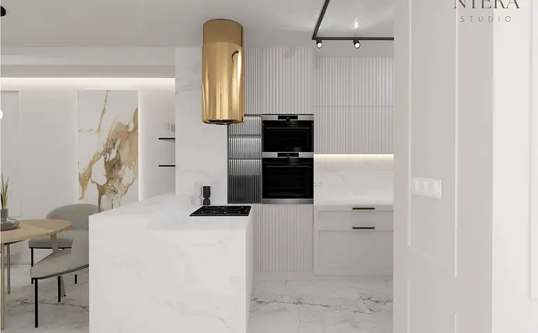 Nowoczesna kuchnia w stylu art deco i minimalistycznym z marmurowymi detalami.