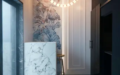 Przedpokój z marmurową ladą, kwiatową tapetą w stylu art deco, eklektycznym i industrialnym.