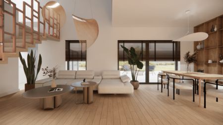Wnętrze salonu w stylu minimalistycznym z roślinami i drewnianymi meblami.