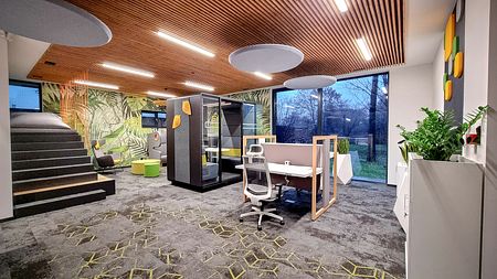 Nowoczesne biuro z roślinnymi motywami i ergonomicznym biurkiem