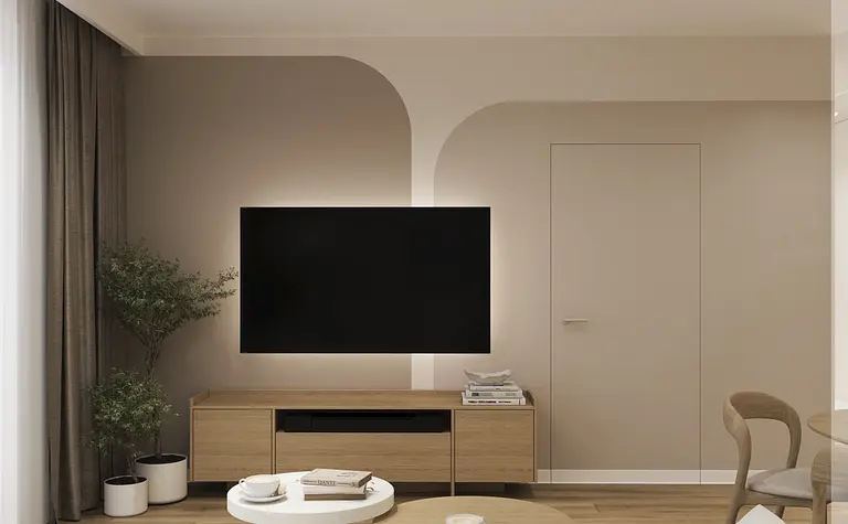 Wnętrze salonu w stylu japandi z telewizorem i drewnianymi akcentami.