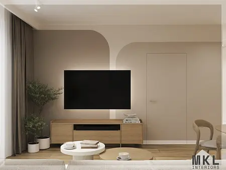 Wnętrze salonu w stylu japandi z telewizorem i drewnianymi akcentami.