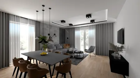 Wnętrze salonu w stylu minimalistycznym z szarymi ścianami i czarnymi detalami.