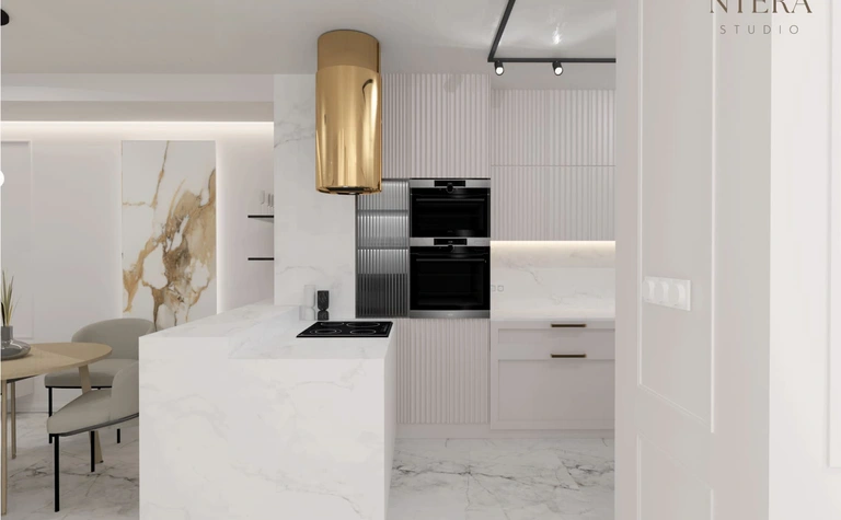 Nowoczesna kuchnia w stylu art deco i minimalistycznym z marmurowymi detalami.