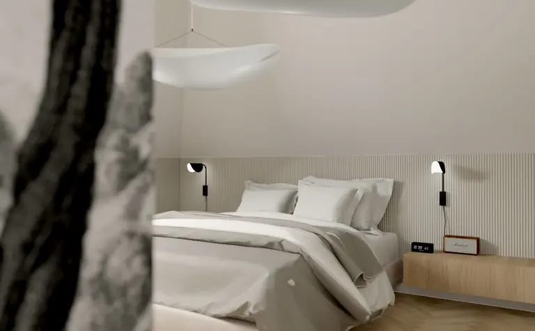 Wnętrze sypialni w soft minimalizmie z tradycyjnym i współczesnym stylem.
