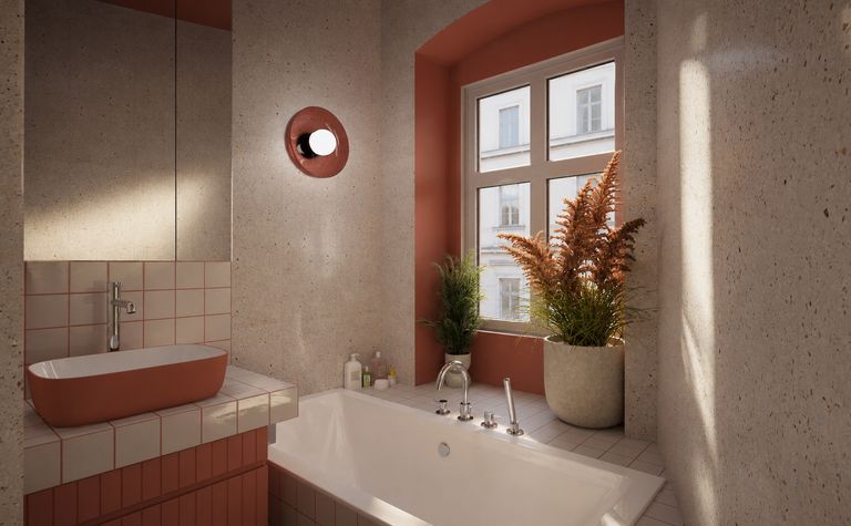 Nowoczesna łazienka z białą wanną, różowymi ścianami i roślinami w stylu dopamine decor, eklektycznym, vintage.