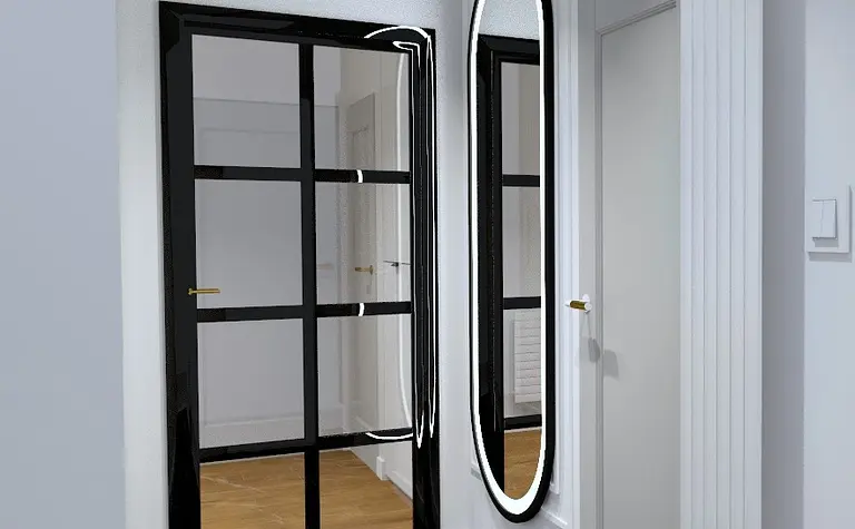 Nowoczesny przedpokój z czarnymi akcentami, lustrem i marmurową podłogą.