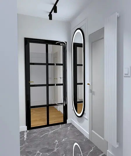 Nowoczesny przedpokój z czarnymi akcentami, lustrem i marmurową podłogą.