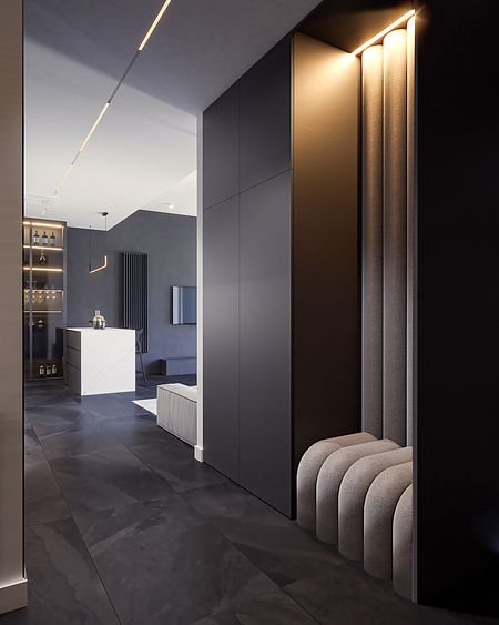 Nowoczesny przedpokój z minimalistycznym wystrojem, szarymi ścianami i stylowymi akcentami.