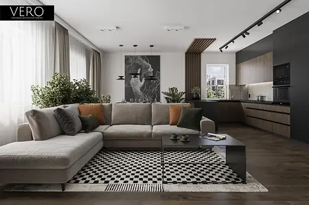 Nowoczesny salon z szarym narożnikiem, roślinnością i drewnianymi detalami.