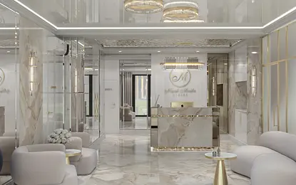 Wnętrze recepcji z marmurową podłogą i jasnymi meblami w stylu glamour.