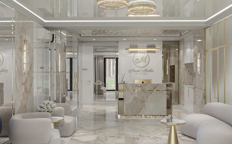 Wnętrze recepcji z marmurową podłogą i jasnymi meblami w stylu glamour.