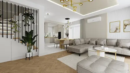 Nowoczesne wnętrze salonu z szarym narożnikiem, drewnianą podłogą i dekoracjami glamour.
