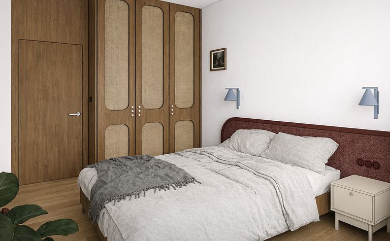 Sypialnia z brązową szafą, szarym łóżkiem i vintage dekoracjami w stylu dopamine decor.