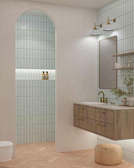 Nowoczesna łazienka z niebieskimi płytkami, drewnianą szafką i elementami prowansalskimi.