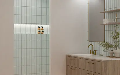 Nowoczesna łazienka z niebieskimi płytkami, drewnianą szafką i elementami prowansalskimi.