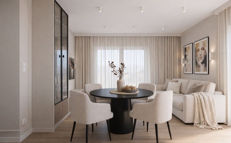 Wnętrze jadalni w stylu quiet luxury i współczesnym z okrągłym stołem i jasnymi krzesłami.
