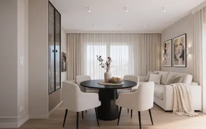 Wnętrze jadalni w stylu quiet luxury i współczesnym z okrągłym stołem i jasnymi krzesłami.