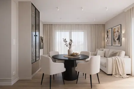 Wnętrze jadalni w stylu quiet luxury i współczesnym z okrągłym stołem i jasnymi krzesłami.