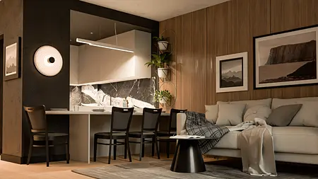 Nowoczesne wnętrze kuchni z drewnianymi elementami i minimalistycznym wystrojem.