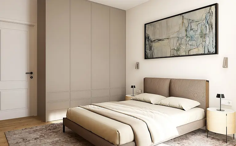 Sypialnia w stylu minimalistycznym z beżowym łóżkiem, szafą i obrazem w stonowanych kolorach.