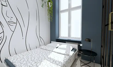 Wnętrze sypialni z białym łóżkiem, niebieską ścianą i roślinnością.